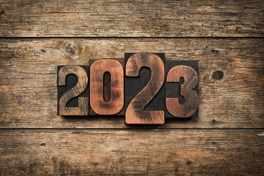 Year 2023 written with wooden letterpress printing blocks