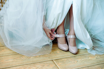 feet of bride and groom, wedding shoes