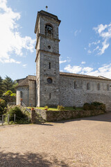 Fototapeta na wymiar Bell tower of Abazzia di Piona, Italy