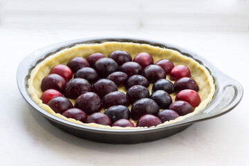 Pie with plum and sour cream filling. Shortbread pie