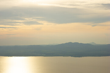Fototapeta premium twilight beautiful yellow sky in reservoir