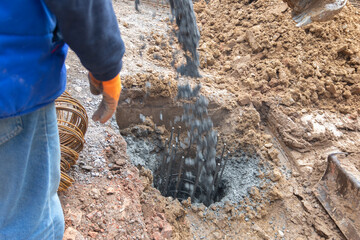 Concreting the foundation piles for the new construction site.Reinforced concrete piles of the new...