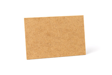 Brown cardboard sheet of paper on white background. Space for your disigne.