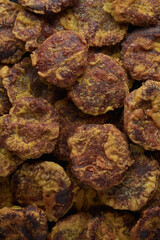close-up of mung bean sweets, also known as mung kavum, traditional sweets in sri lanka, made with mung beans and rice flour, sweetened with kithul treacle, full frame food background