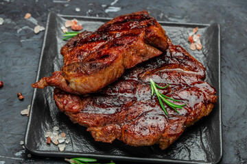 grilled pork chops with herbs and spices. Food recipe background. Close up