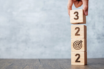 2023 block with dartboard sign. Business Goal, Target, Resolution, strategy, plan, Action...