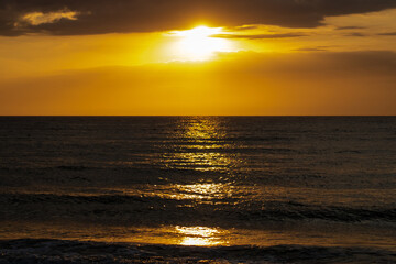 crimson sunset over sea