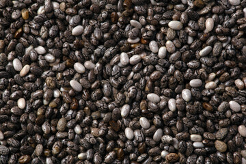 chia seeds on a white background, Color and detail of chia seeds close-up.