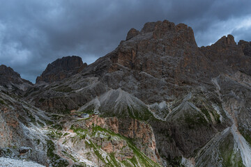 The landscape and the peaks of the Dolomites of the Val di Fassa, one of the most famous and touristic valleys of Trentino, near the town of Canazei, Italy - August 2022.