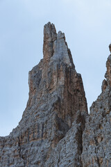The landscape and the peaks of the Dolomites of the Val di Fassa, one of the most famous and touristic valleys of Trentino, near the town of Canazei, Italy - August 2022.