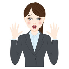 woman in gray suit with ponytale is surprised