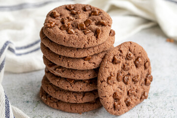 Chocolate chip biscuits on gray background. close up