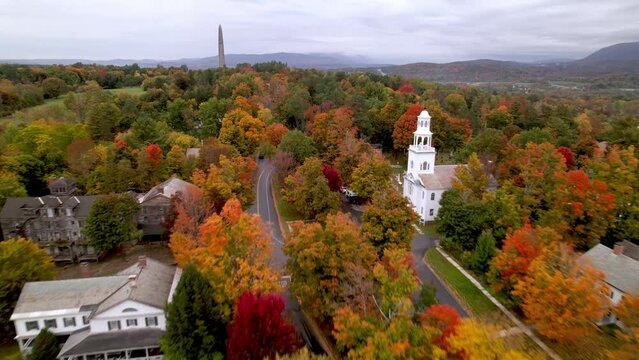 aerial fast push over church in fall in bennington vermont