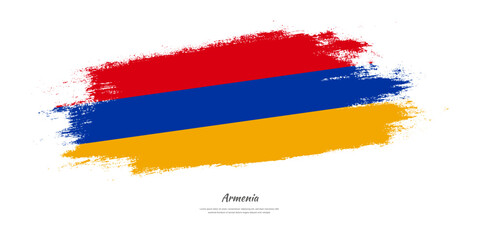 Happy Independence Day of Armenia. National flag on artistic stain brush stroke background.