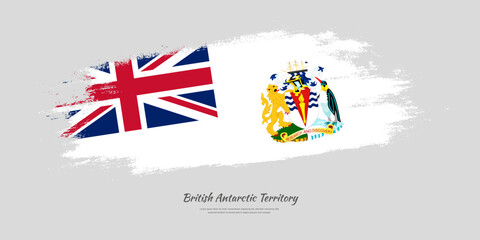 Happy National Day of British Antarctic Territory. National flag on artistic stain brush stroke background.