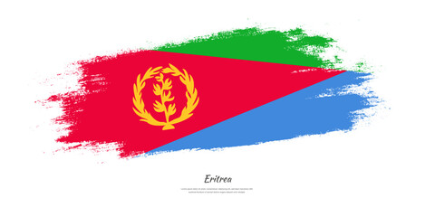 Happy Independence Day of Eritrea. National flag on artistic stain brush stroke background.