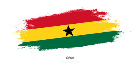Happy Independence Day of Ghana. National flag on artistic stain brush stroke background.