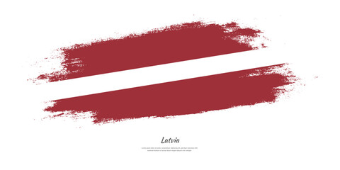 Happy Independence Day of Latvia. National flag on artistic stain brush stroke background.