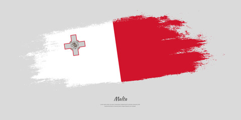 Happy Independence Day of Malta. National flag on artistic stain brush stroke background.