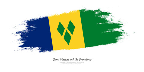 Happy Independence Day of Saint Vincent and the Grenadines. National flag on artistic stain brush stroke background.