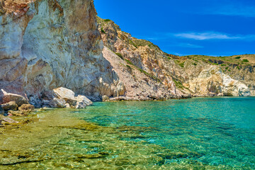 Fototapeta na wymiar Beautiful view of high hill slope of island in Mediterranean Sea. Blue