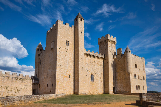 the castle of beynac in summer with blue sky