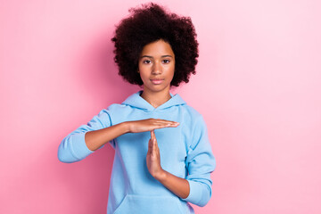 Photo of serious pretty afro girl stylish clothes two hand symbol warning deadline time up finish...