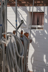 Luxurious wood paneled steam sailing windjammer boat yacht liner with public lounge, porthole...