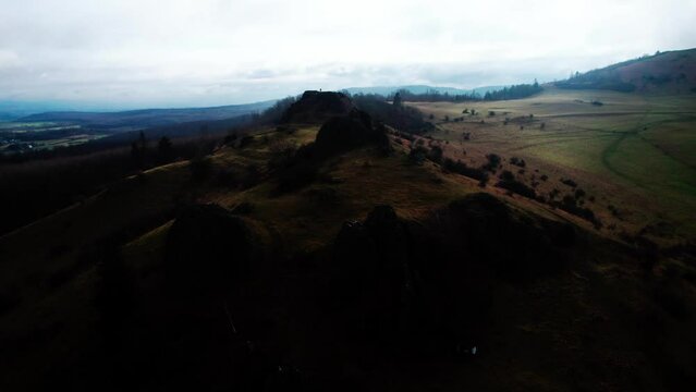 Majestic aerial drone view flying above Stroud countryside hills, circle pan