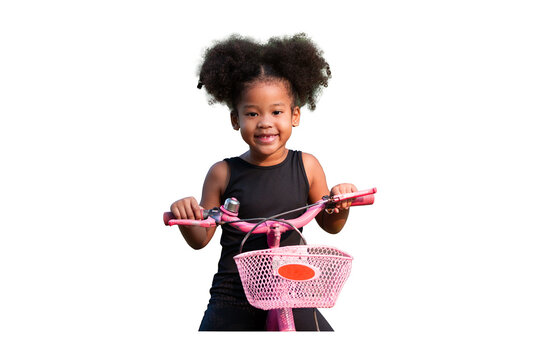 African American little curly cute girl riding bicycle on transparent background. Kid playing with bicycle