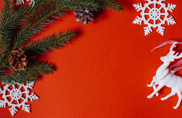 christmas background - pine tree branches, presents and decor on green copy space background