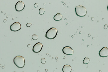 Drops of rain on glass