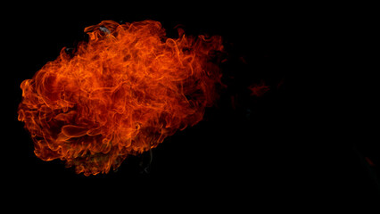Fire blasts on black background, close-up