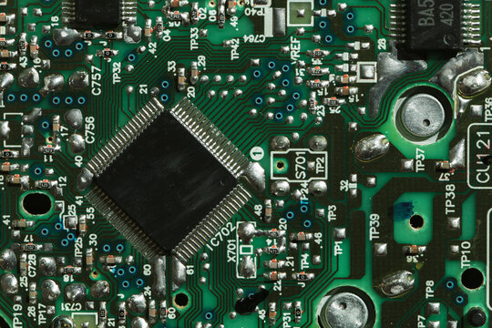 Green printed circuit top view with microchip