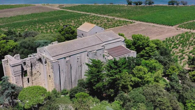 Maguelone Cathedral is a Roman Catholic church or cathedral located  in the H&eacute;rault department of France. The building stands on an isthmus between the &Eacute;tang de l'Arnel lake and the Mediterranean Sea.