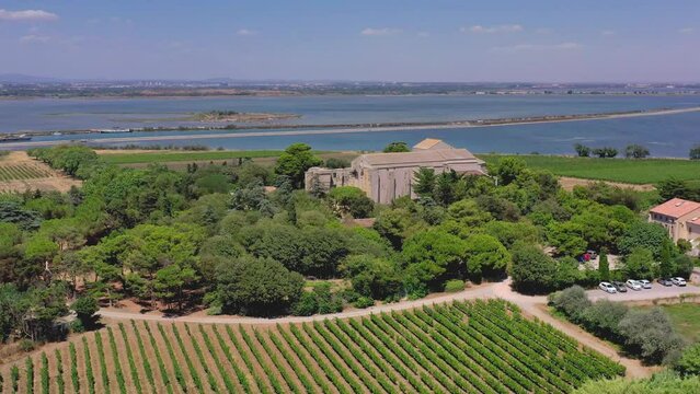 Maguelone Cathedral is a Roman Catholic church cathedral located in the H&eacute;rault department of France. The building stands on an isthmus between the &Eacute;tang de l'Arnel lake and the Mediterranean Sea