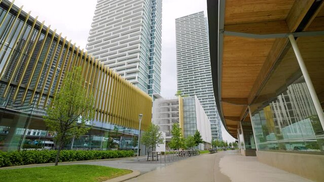 Modern condo towers at the VMC Vaughan Metropolitan Centre in Canada, dolly forward
