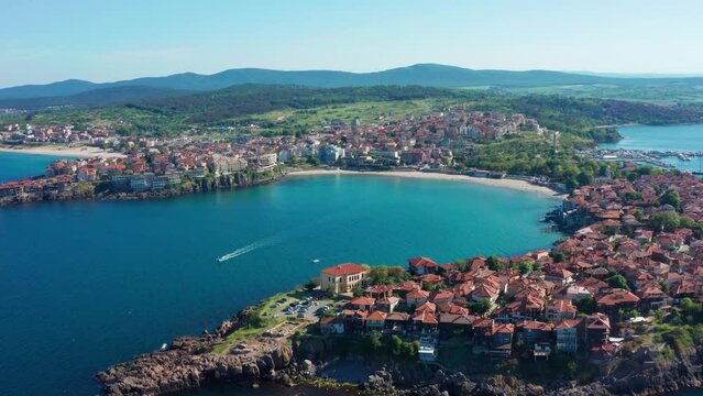 Aerial view of Sozopol old town with boat between the coasts