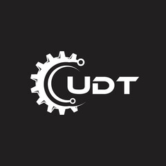 UDT letter technology logo design on black background. UDT creative initials letter IT logo concept. UDT setting shape design.
