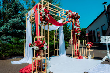 Wedding ceremony. wedding arch, decorated with various fresh flowers