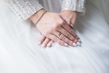 man and woman with wedding ring.Young married couple holding hands,