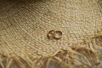 Fototapeta na wymiar Two wedding rings on the floor with contrast