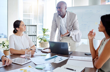 Business, black man and speaker, presentation leader and planning with business people in meeting. Diversity, laptop and paperwork, talking and listening to corporate pitch and project strategy.