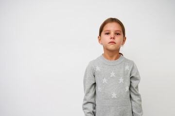 Cute little crying girl on white background with copy space