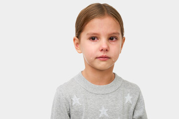 Cute little crying girl on white background with copy space