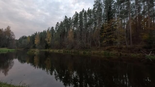 Nelku Red Sandstone Cliffs at the River Salaca in Skanaiskalns Nature Park in Mazsalaca in Latvia, Autumn Time. Sandstone Geological Formation