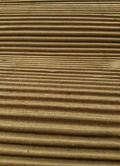 A close up view of a brown cardboard 