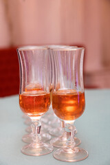 glasses of champagne with air bubbles on the background