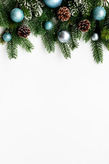 Christmas and New Year holiday frame background with fir and deco baubles