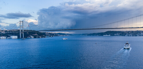 Fototapeta premium Aerial view of the Bosporous strait separating the city of Istanbul in an early summer morning